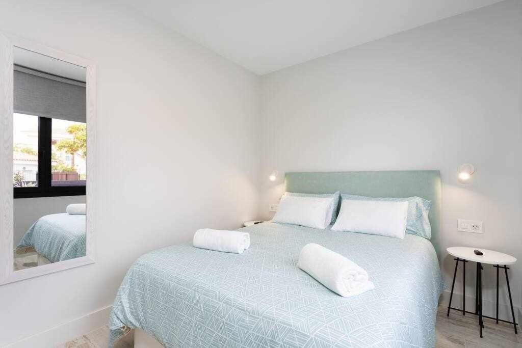 Postel nebo postele na pokoji v ubytování Sunnyland Villa Sueño Azul