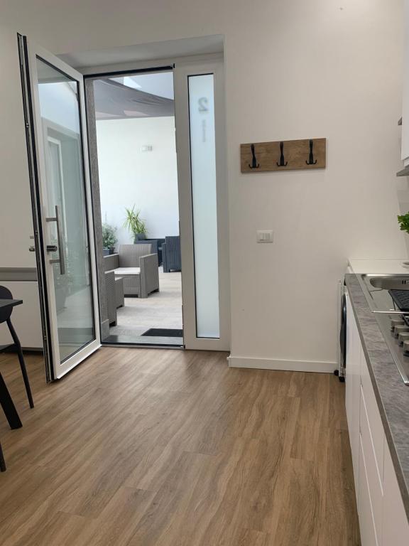 Kép Rosato Suites 2 - Appartamento moderno e confortevole con spazio esterno tra Mondello e il centro storico szállásáról Palermóban a galériában
