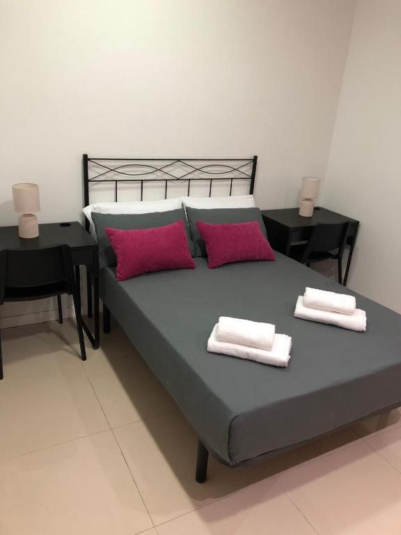 Posteľ alebo postele v izbe v ubytovaní La Victoria Home