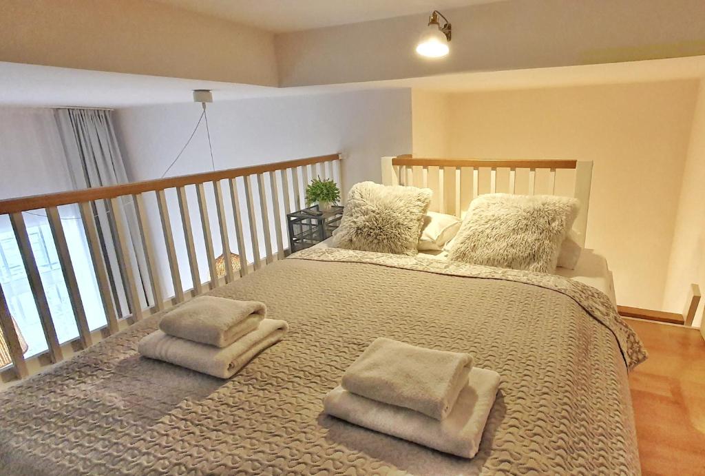 Posteľ alebo postele v izbe v ubytovaní Holiday Home Aparthotel 009 z balkonem przy plaży