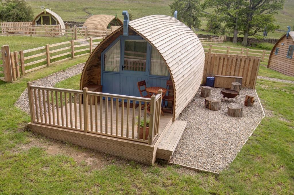 a gazebo in a yard with a fence at Finest Retreats - The Wonneys Glamping in Hexham