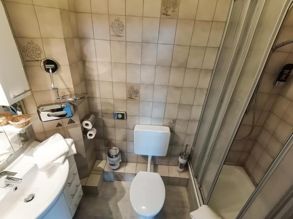 Koupelna v ubytování Hotel Kitzinger Hof an der B8