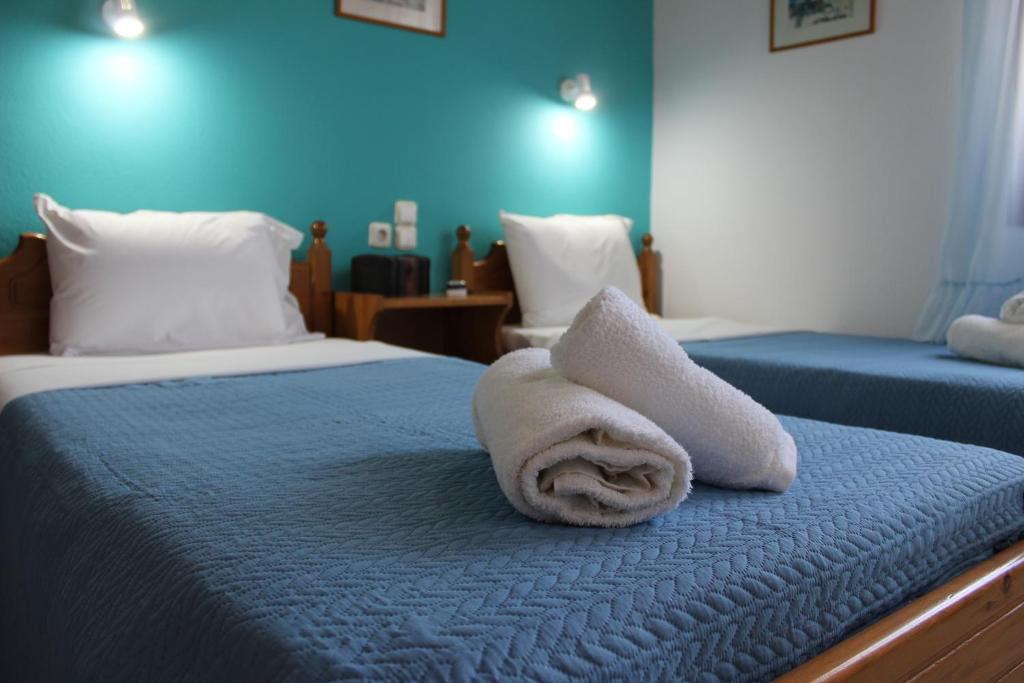 Postel nebo postele na pokoji v ubytování Anastazia Paradise