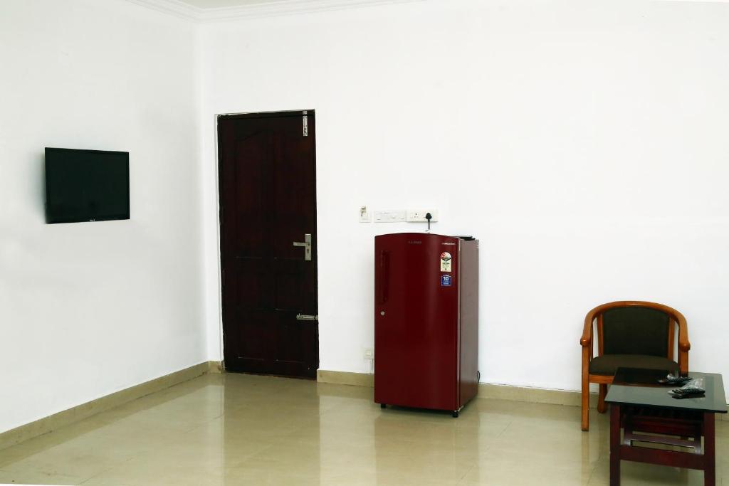 TV a/nebo společenská místnost v ubytování AWA Residency