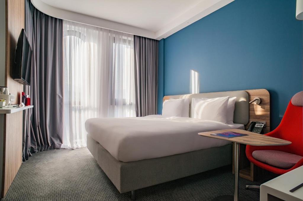 Postel nebo postele na pokoji v ubytování Holiday Inn Express Tbilisi Avlabari by IHG