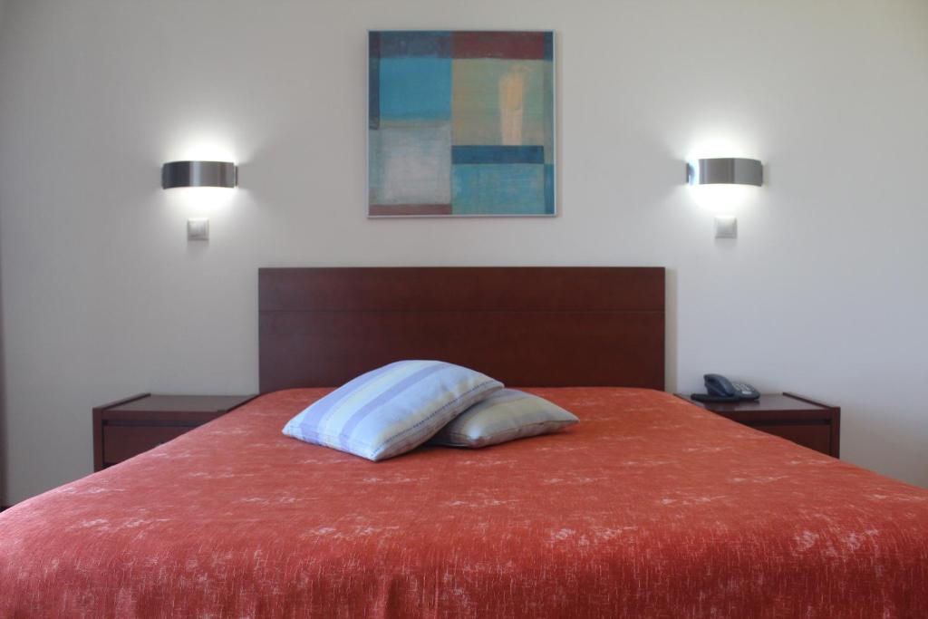 Postel nebo postele na pokoji v ubytování Hotel Dom Afonso - Monção
