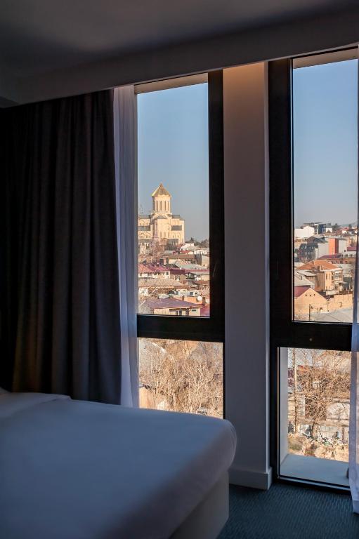 Postel nebo postele na pokoji v ubytování Holiday Inn Express Tbilisi Avlabari by IHG