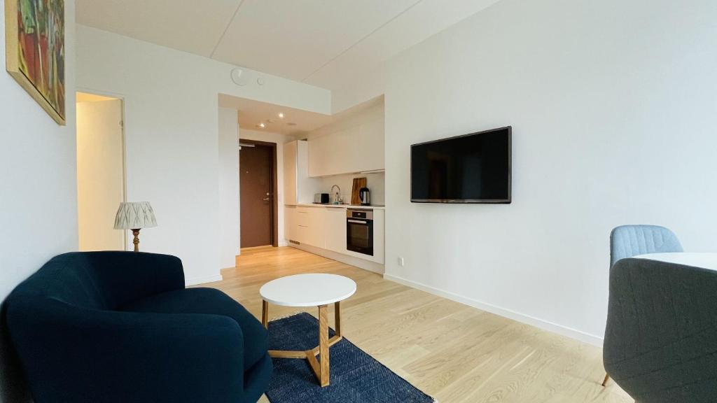 TV a/nebo společenská místnost v ubytování ApartmentInCopenhagen Apartment 1527