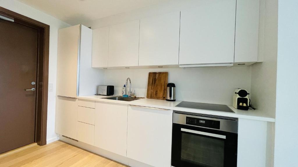 Kuchyň nebo kuchyňský kout v ubytování ApartmentInCopenhagen Apartment 1527