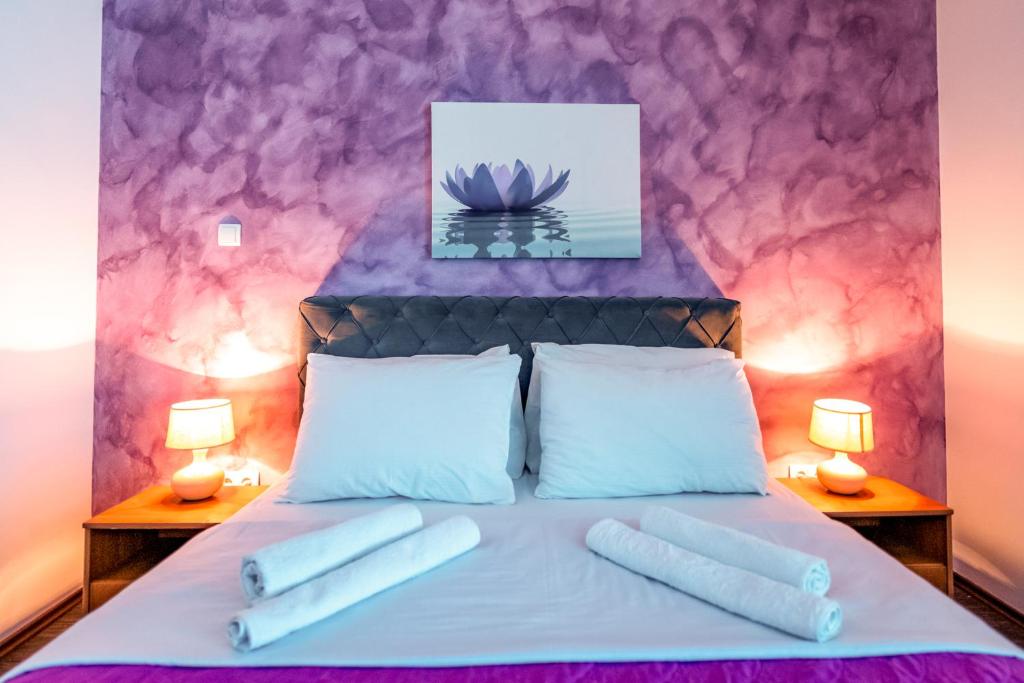 Postel nebo postele na pokoji v ubytování Hotel Oasis