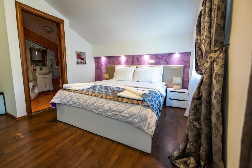 Postel nebo postele na pokoji v ubytování Hotel Oasis