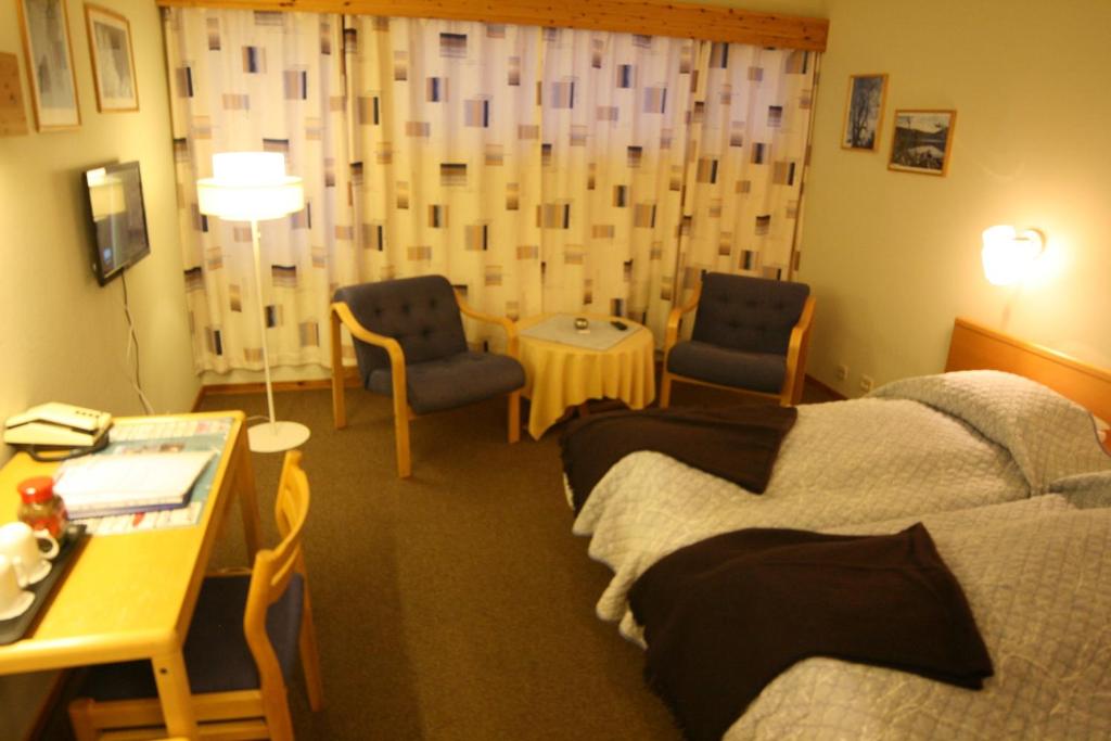 Posezení v ubytování Overhalla Hotel