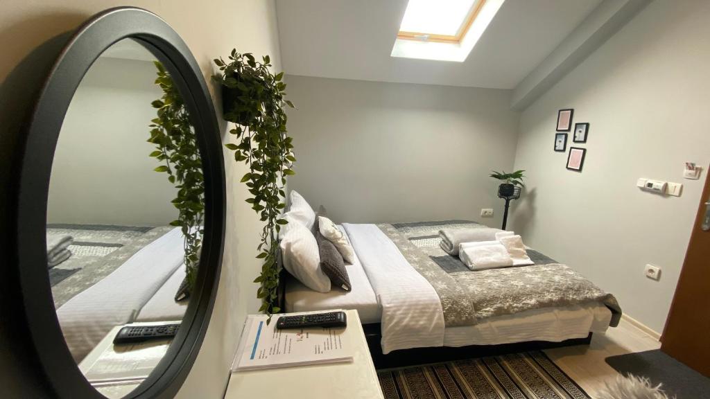 Postel nebo postele na pokoji v ubytování VonAmor Rooms