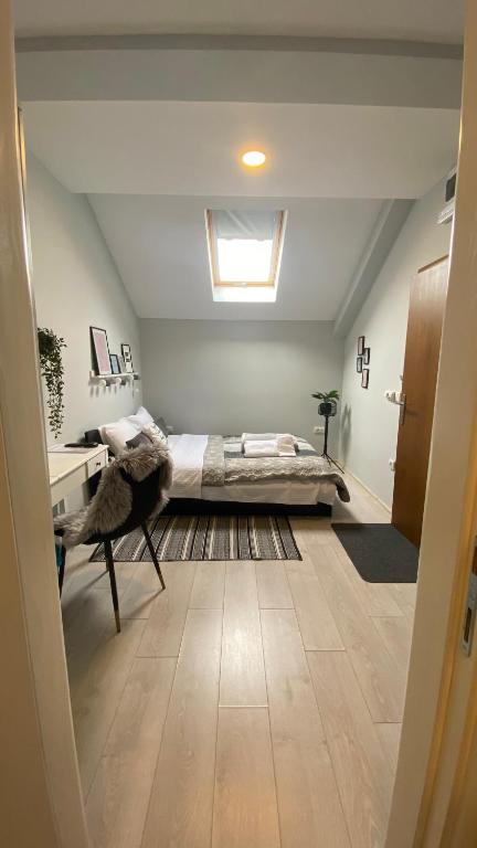 Postel nebo postele na pokoji v ubytování VonAmor Rooms
