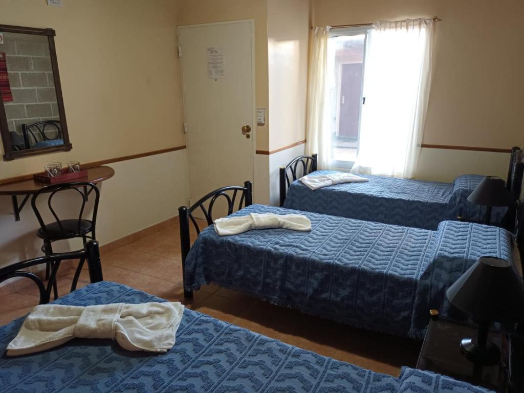 Postel nebo postele na pokoji v ubytování Vila Sornico