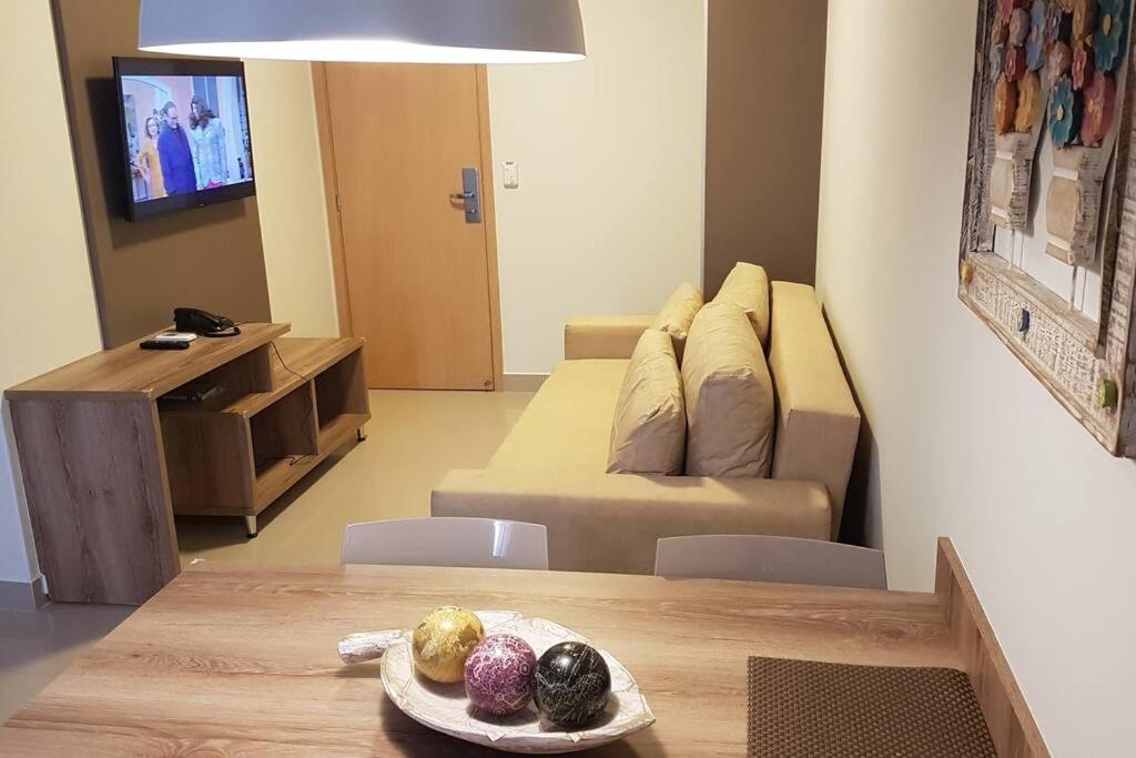 TV a/nebo společenská místnost v ubytování Park Veredas Flat Service