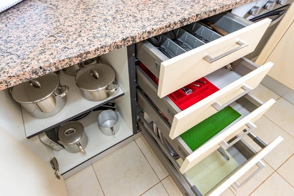 Kuchyň nebo kuchyňský kout v ubytování Apartamentos Carruna