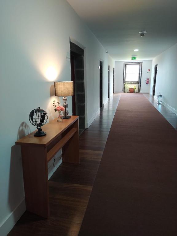Ένα ή περισσότερα κρεβάτια σε δωμάτιο στο Azores Youth Hostels - Pico