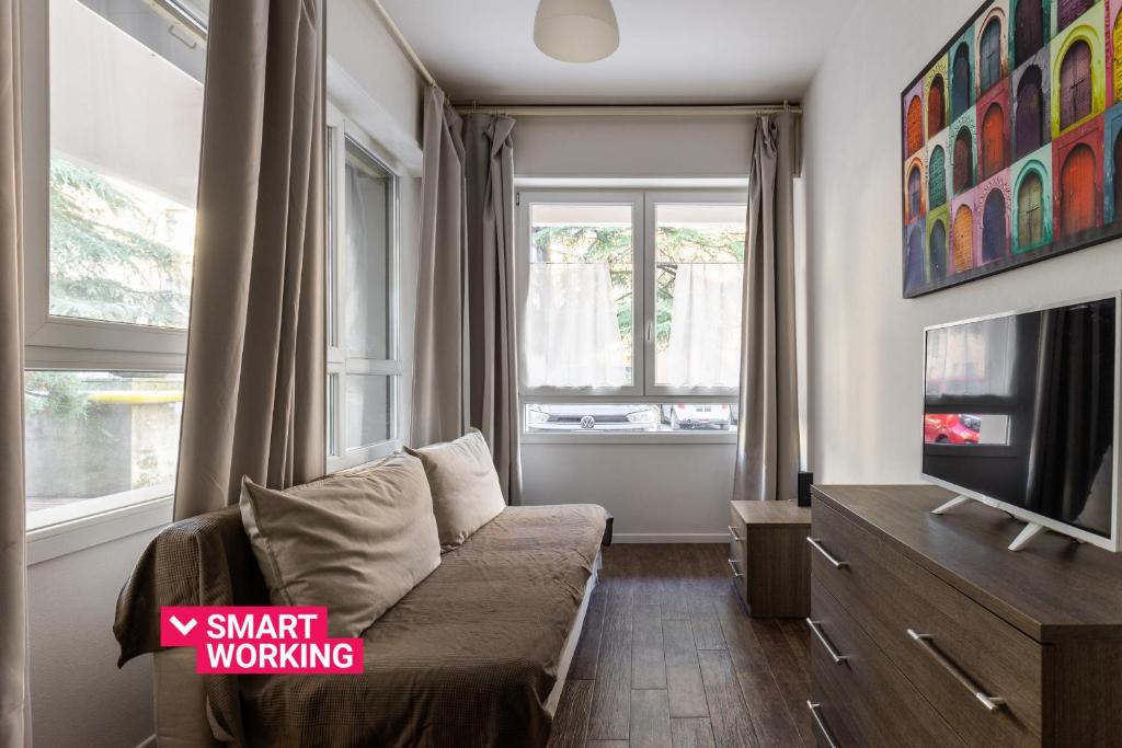 Et tv og/eller underholdning på Largo Molina Apartment 1 by Wonderful Italy