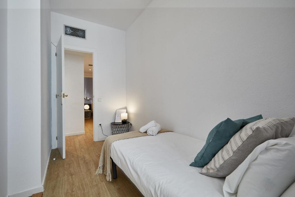 Posteľ alebo postele v izbe v ubytovaní BBarcelona Clot Apartments