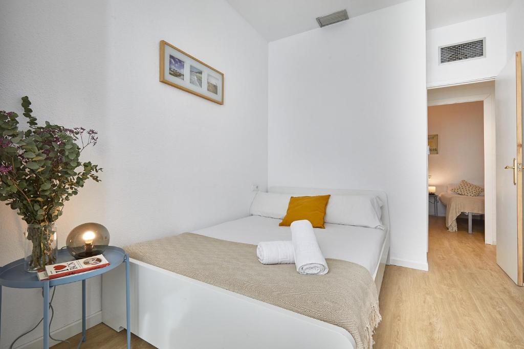 Posteľ alebo postele v izbe v ubytovaní BBarcelona Clot Apartments