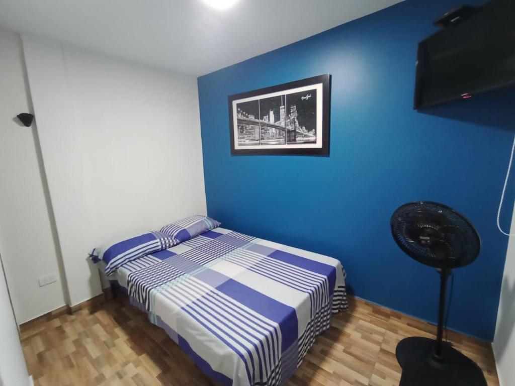 Postel nebo postele na pokoji v ubytování Hostal Avanza