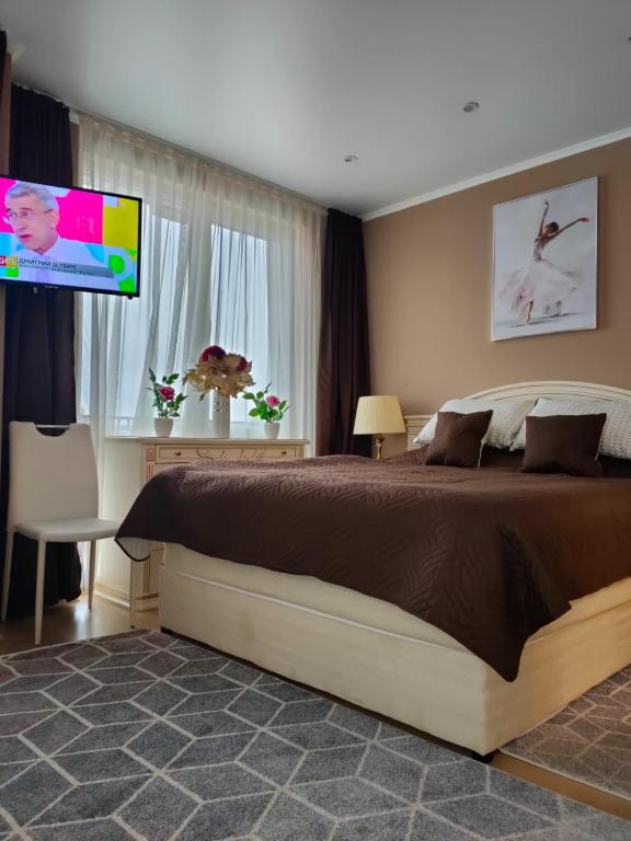 TV a/nebo společenská místnost v ubytování Afrodita Palas , studio appartment 4 floor, pool view