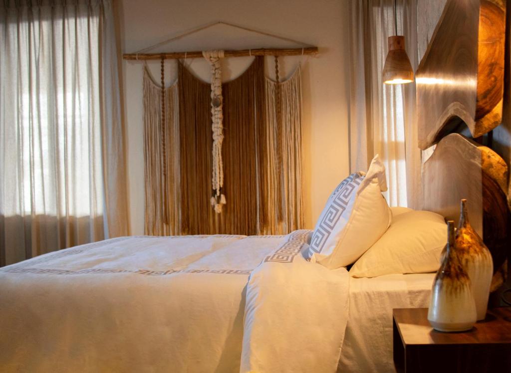 Postel nebo postele na pokoji v ubytování Hotel Scappata
