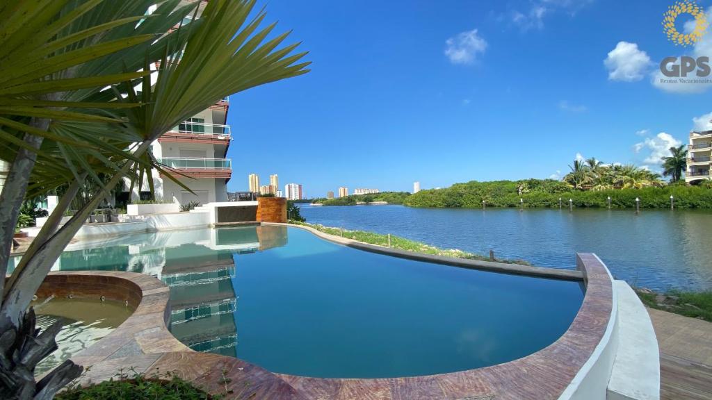 Bazén v ubytování Habitación hotelera 5min de la playa by G P S rentas nebo v jeho okolí