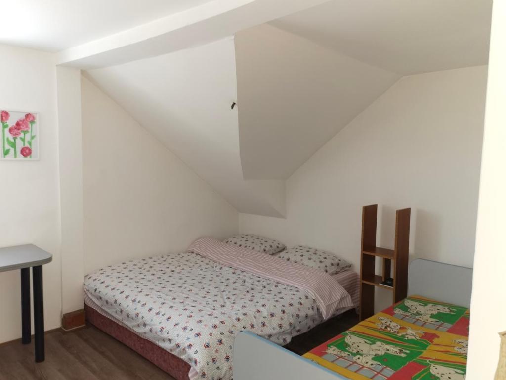 Postel nebo postele na pokoji v ubytování Delfin apartment