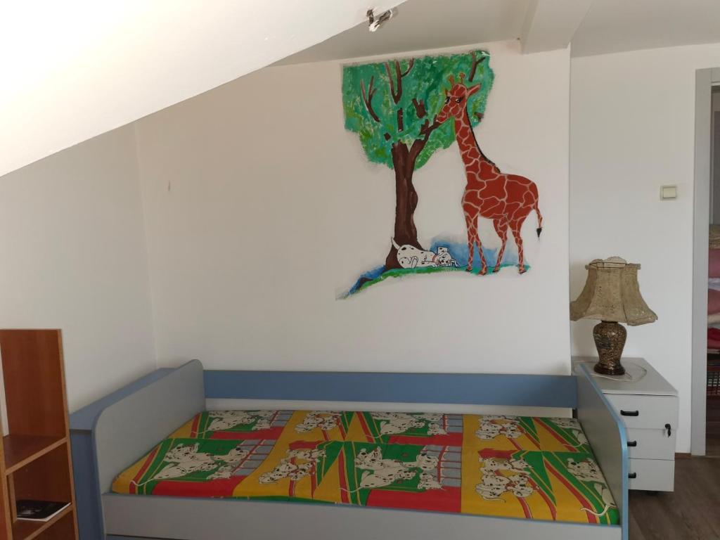 Postel nebo postele na pokoji v ubytování Delfin apartment
