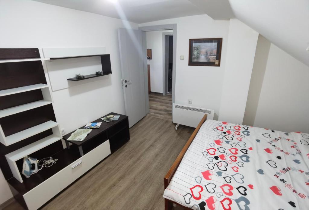 Postel nebo postele na pokoji v ubytování Delfin apartment