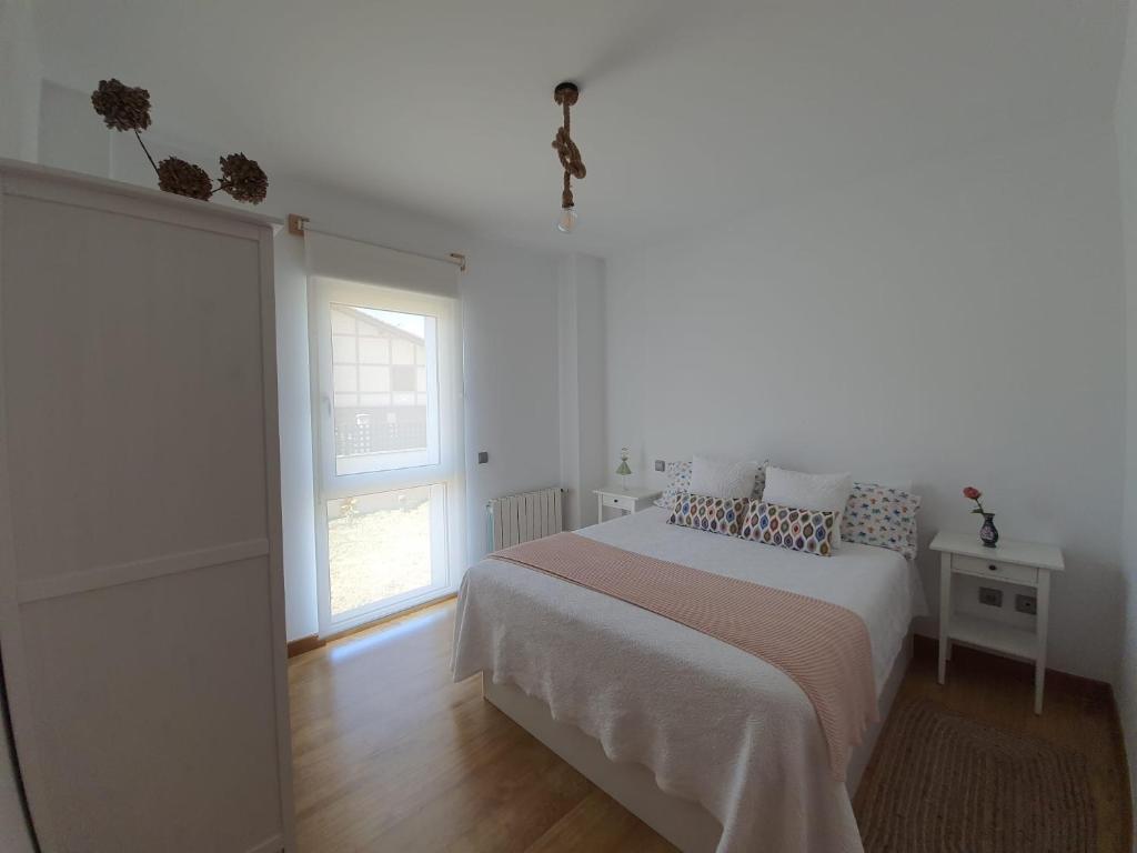 A bed or beds in a room at El Rincón de Gabriela
