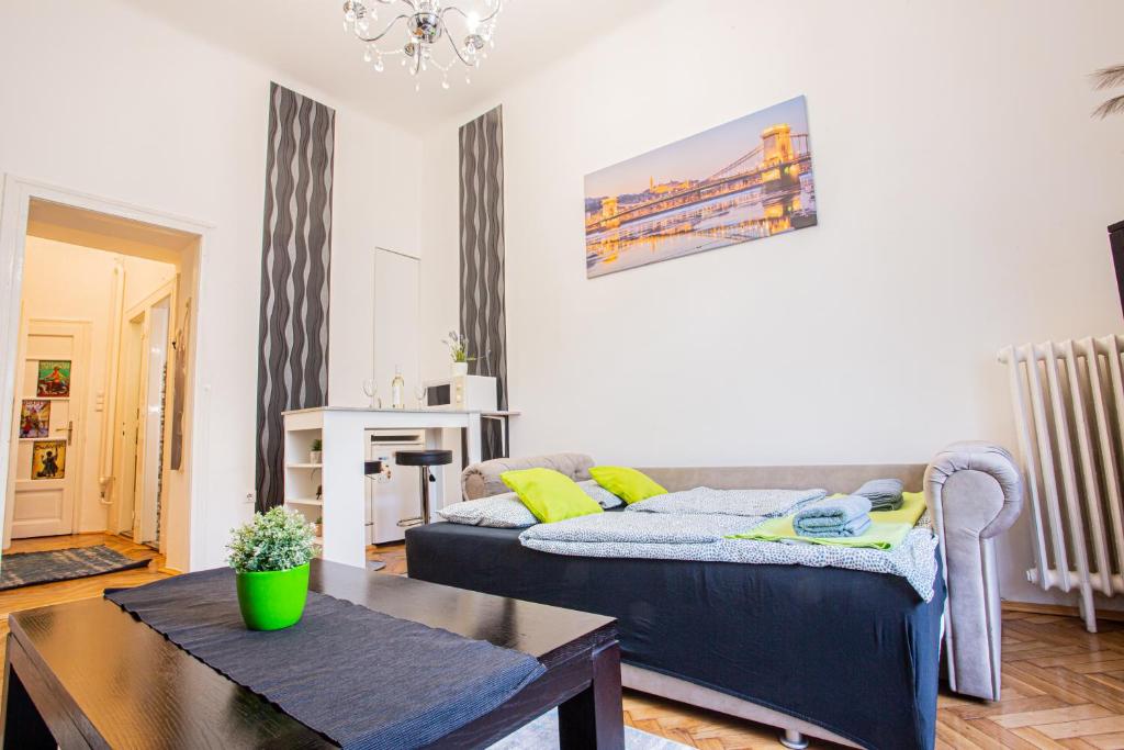 A bed or beds in a room at Váci Street Studio