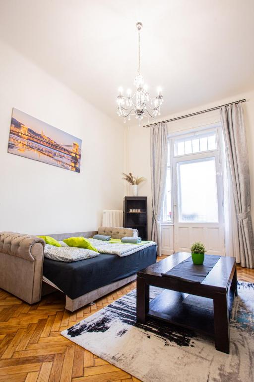 A bed or beds in a room at Váci Street Studio