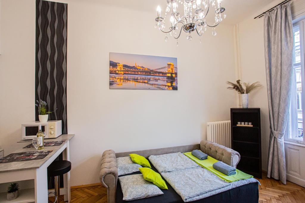 A bed or beds in a room at Váci Street Studio
