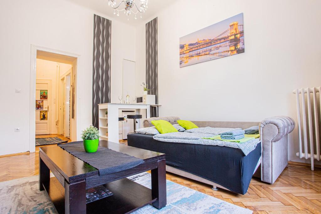 A bed or beds in a room at Váci Street Studio