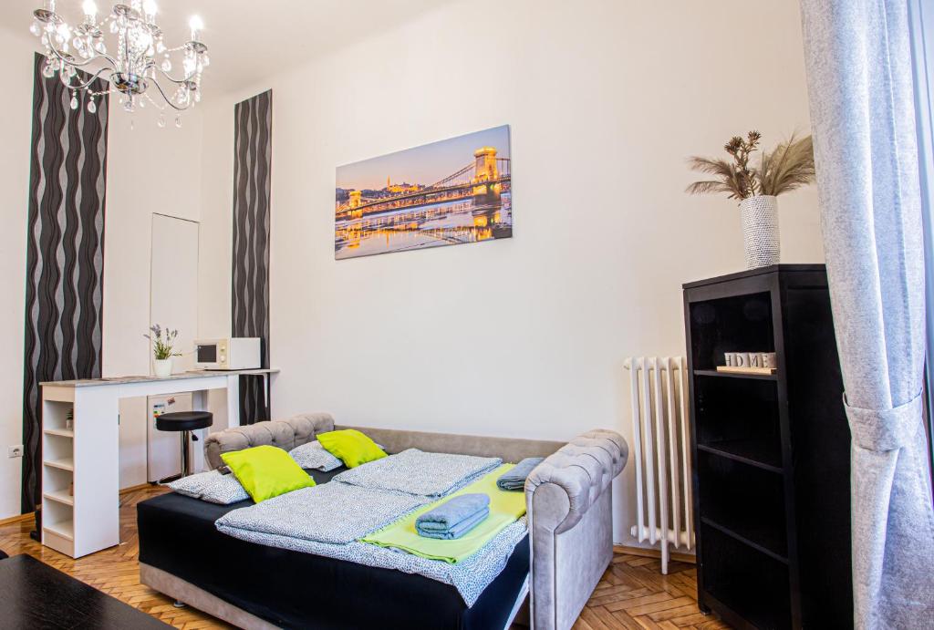 A bed or beds in a room at Váci Street Studio