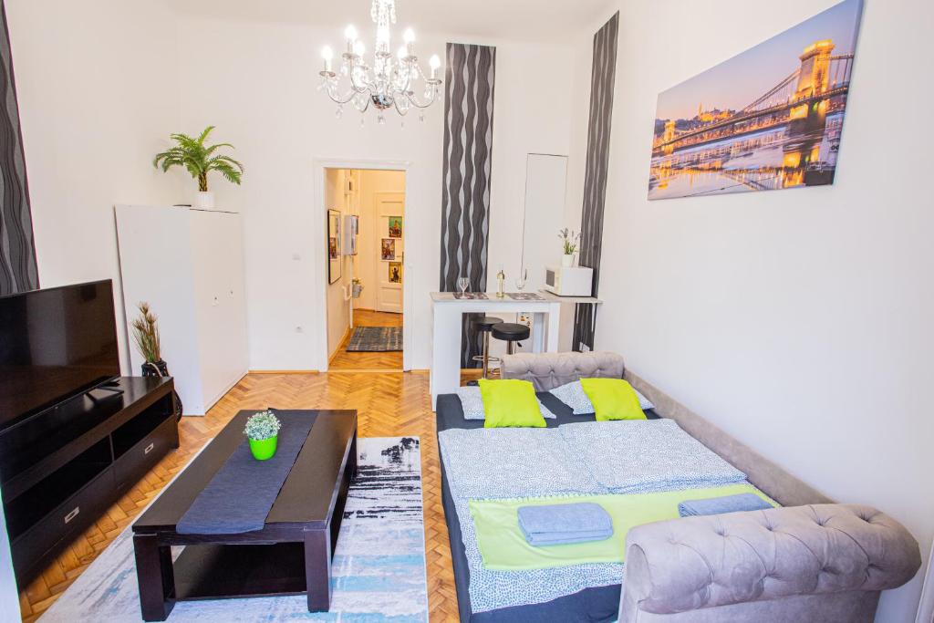 A bed or beds in a room at Váci Street Studio