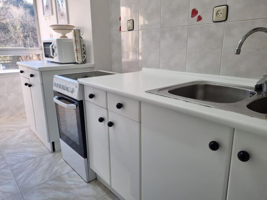 Kuchyň nebo kuchyňský kout v ubytování C09A01 Apartamento Somo