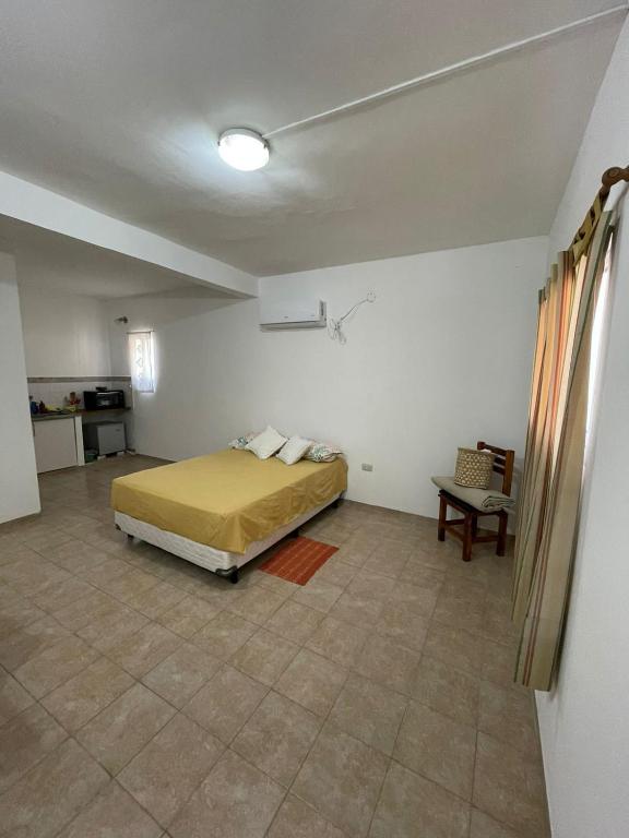 Ένα ή περισσότερα κρεβάτια σε δωμάτιο στο La Escala lll