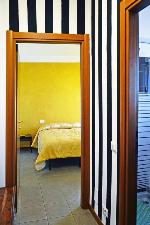Postel nebo postele na pokoji v ubytování Apartment Il Fiore