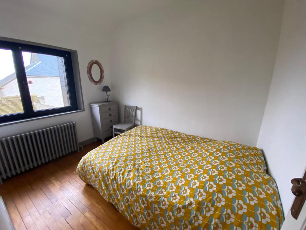 Postel nebo postele na pokoji v ubytování Le petit gîte des Moyens-Ducs