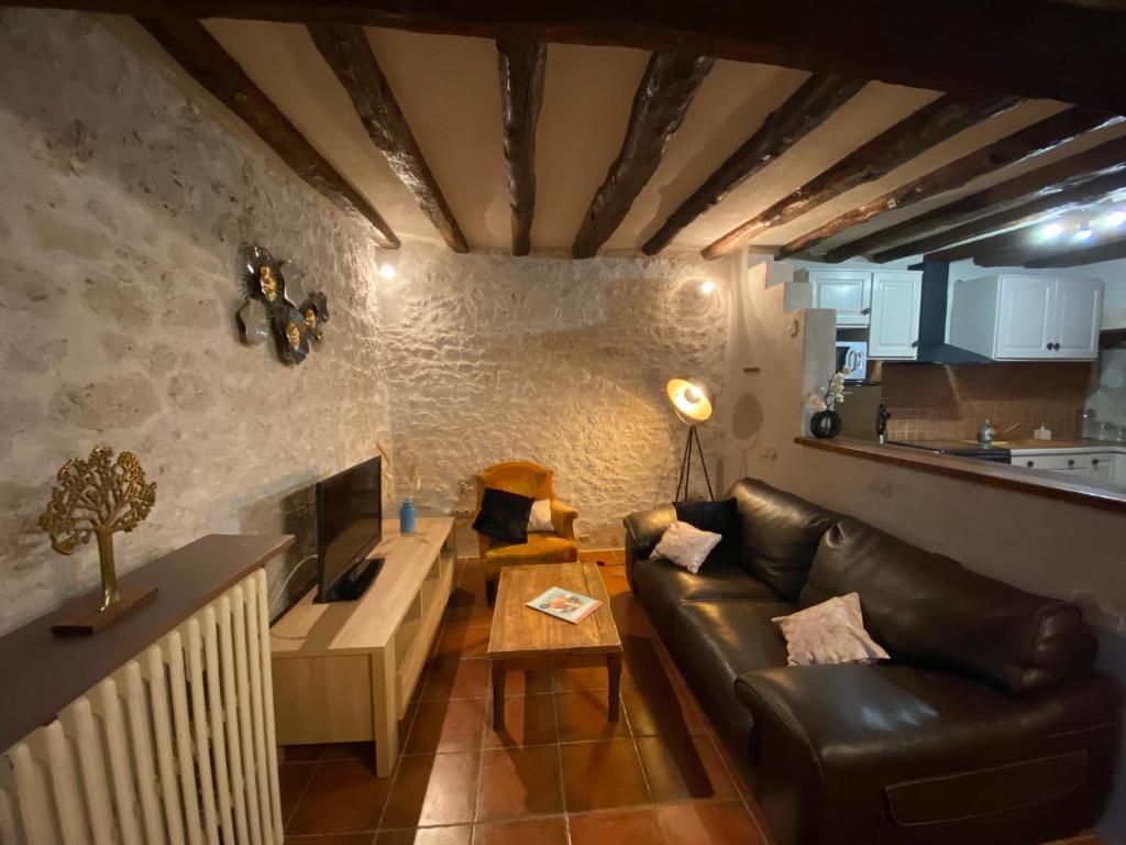 Posezení v ubytování Le petit gîte des Moyens-Ducs