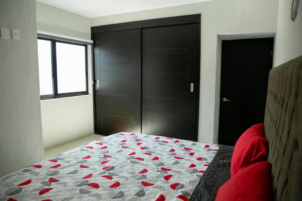 Postel nebo postele na pokoji v ubytování TORRE CARRANZA