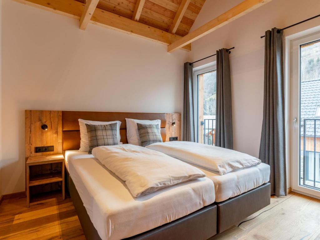Cama o camas de una habitaci&oacute;n en Mountain Chalet Alpinchique 2