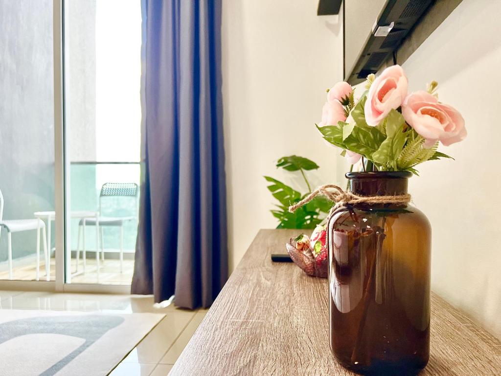Posezení v ubytování The D Carlton HomeStay 2BR