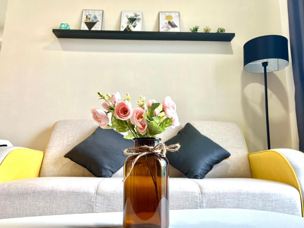 Posezení v ubytování The D Carlton HomeStay 2BR
