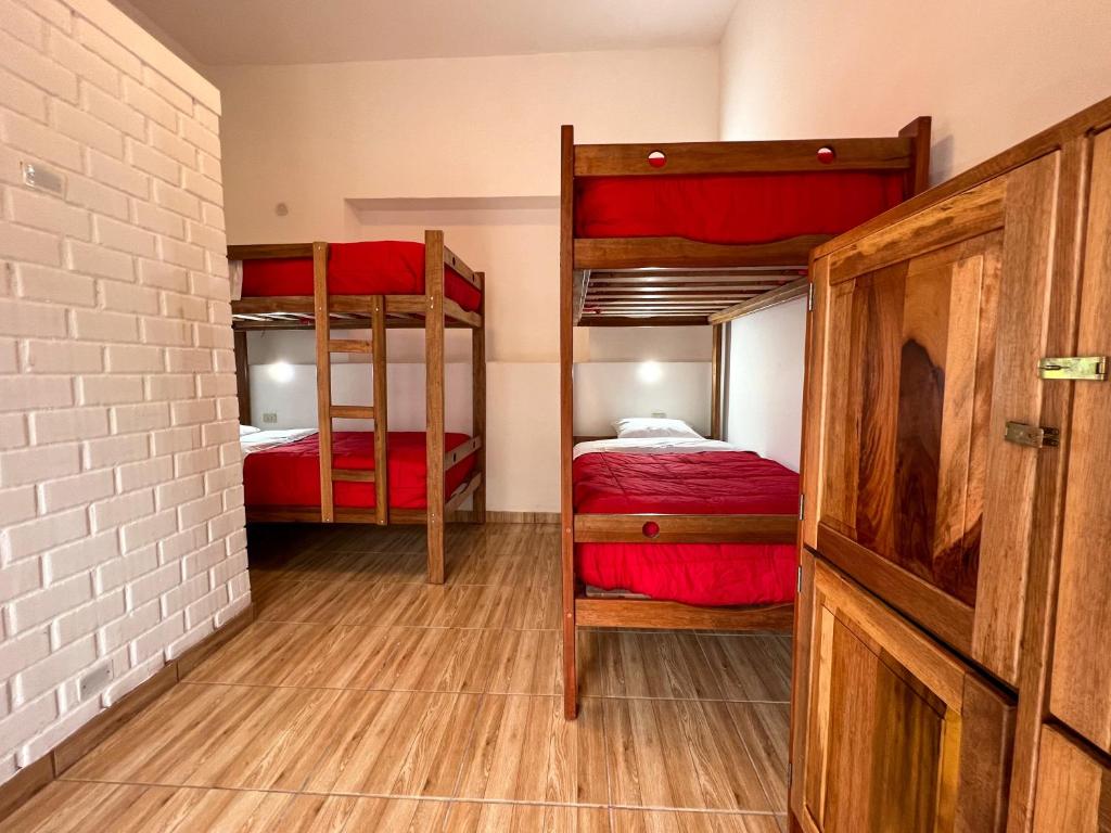 Postel nebo postele na pokoji v ubytování Tupac Huaraz