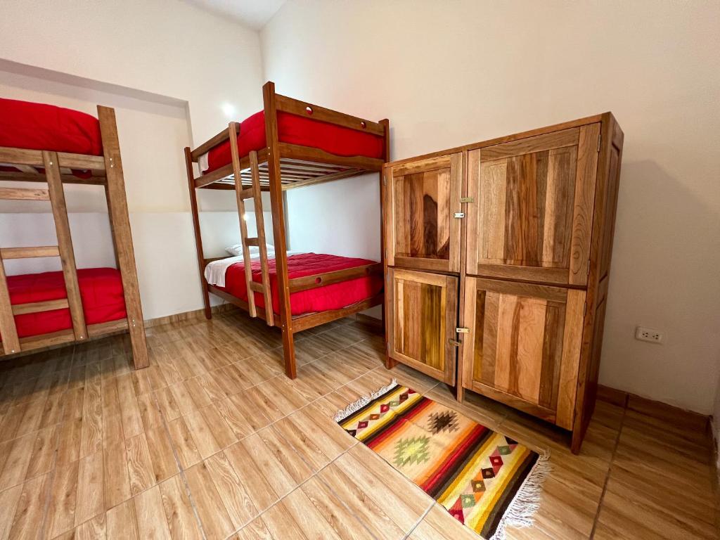 Postel nebo postele na pokoji v ubytování Tupac Huaraz